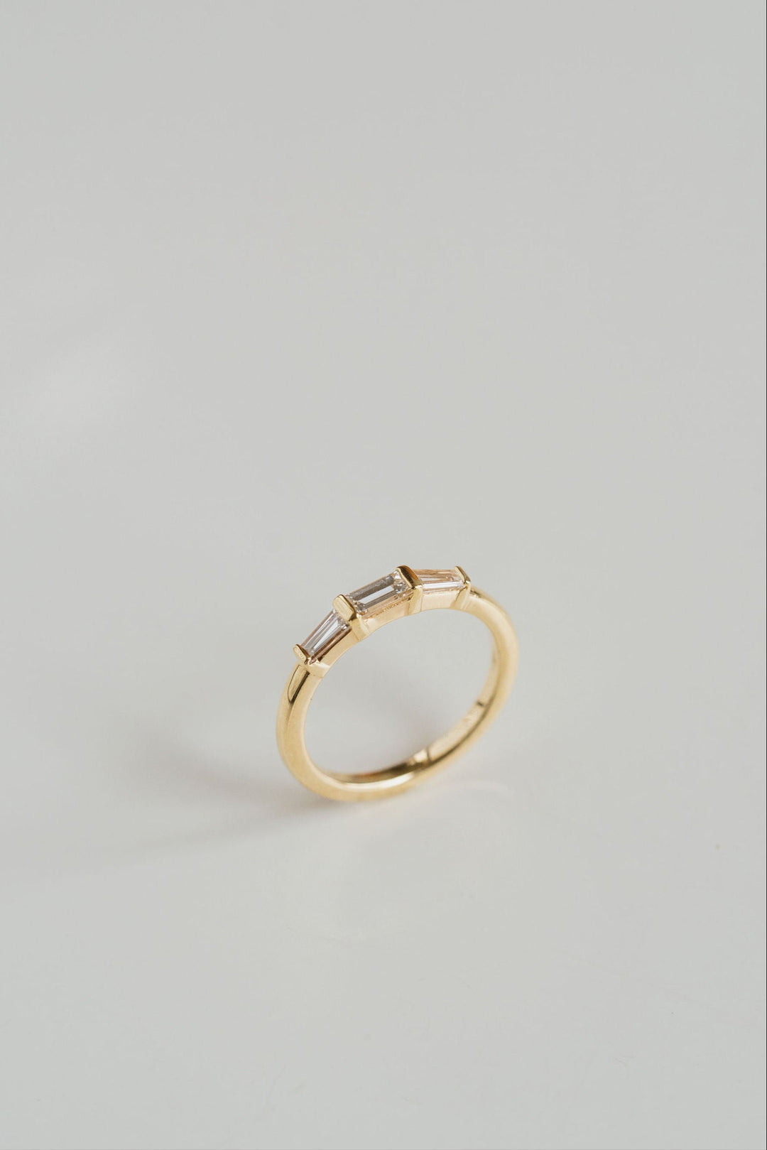 East-West Straight and Tapered Baguette Diamond Band