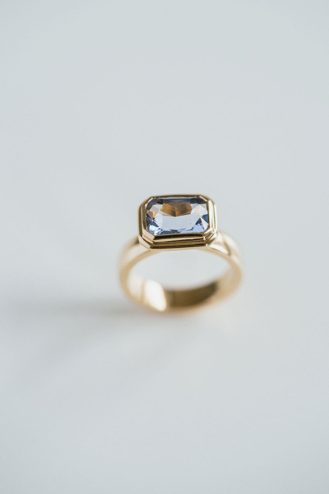 Emerald Cut Blue Sapphire Retro Bezel