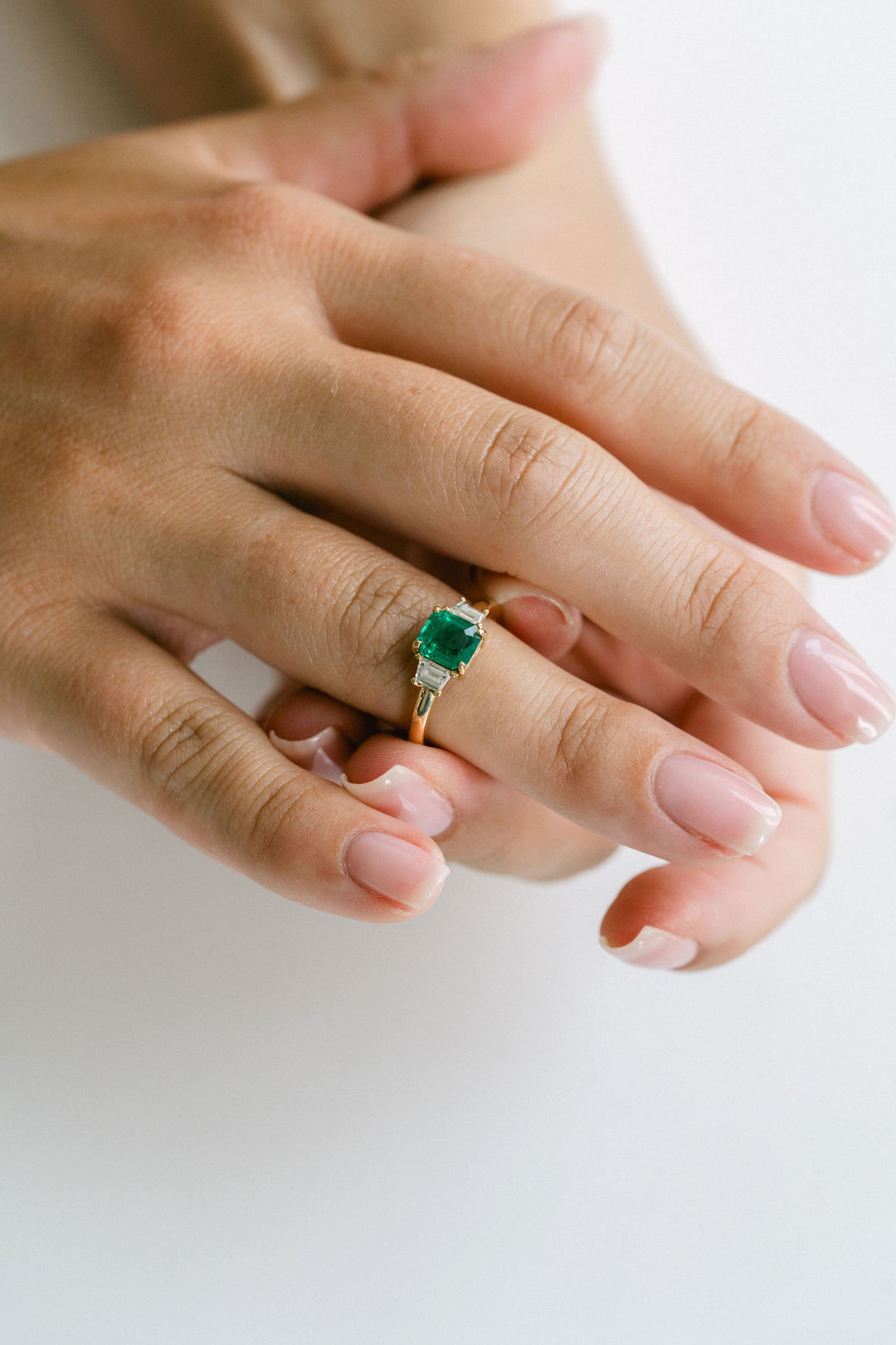 Emerald Cut Emerald With Trapezoid Diamond Accents