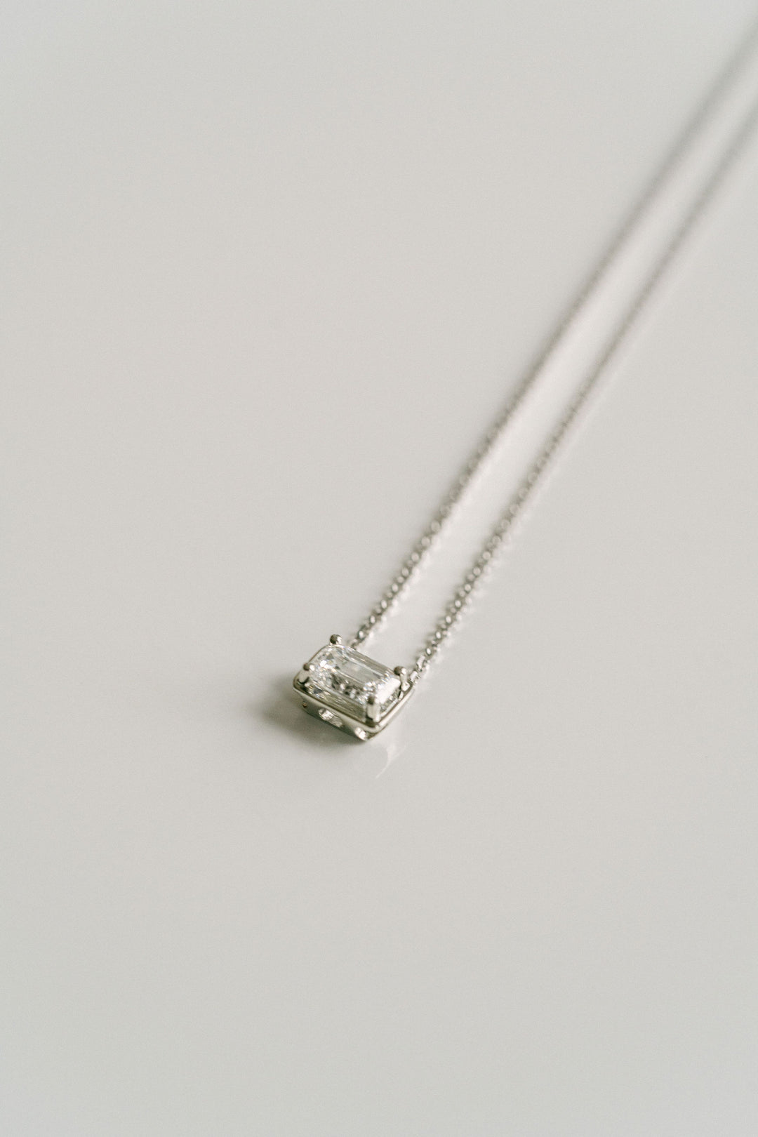 Emerald Cut East-West Framed Diamond Slider Necklace