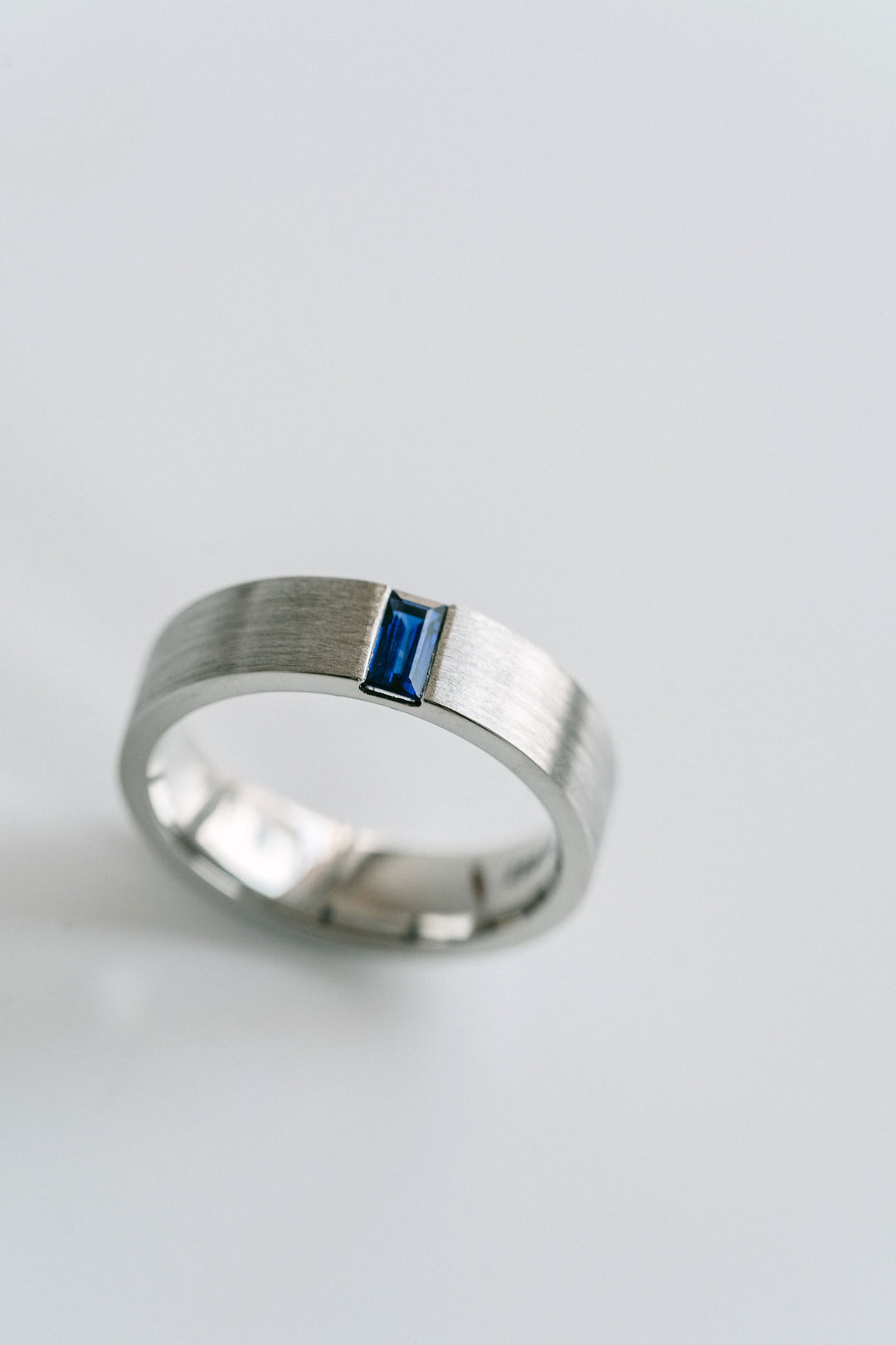 Flat Brushed Mens Band With Baguette Blue Sapphire