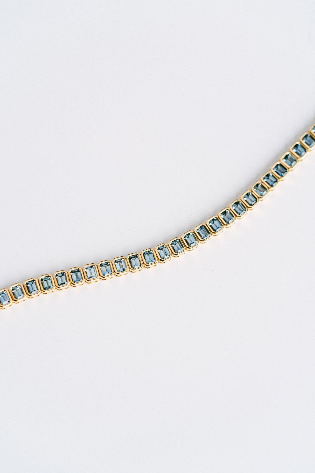 9.21ctw. Emerald Cut Blue-Green Sri Lankan Sapphire Bezel Tennis Bracelet, 14k Yellow Gold