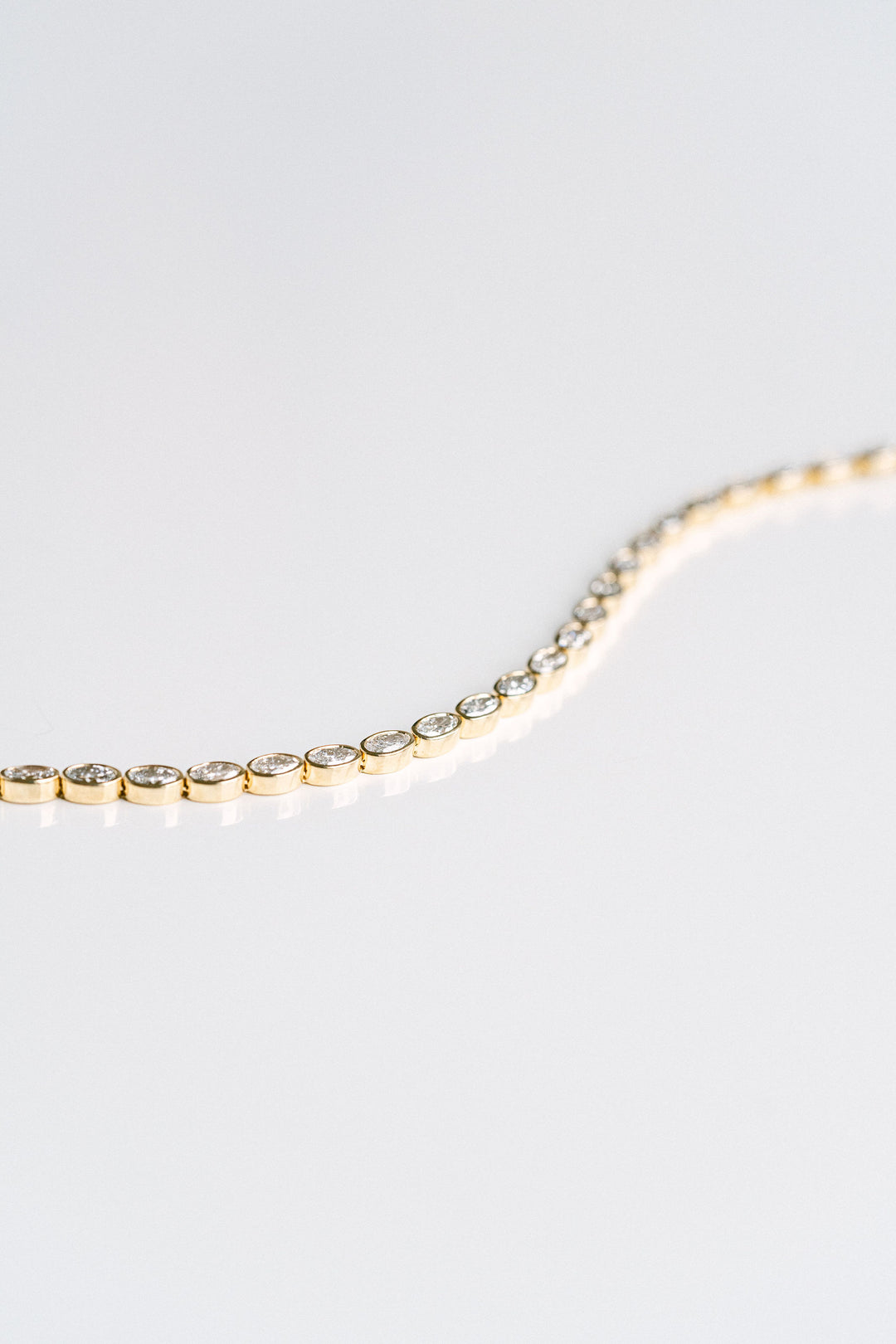 5.36ctw. Oval Lab Diamond Bezel Tennis Bracelet, 14k Yellow Gold