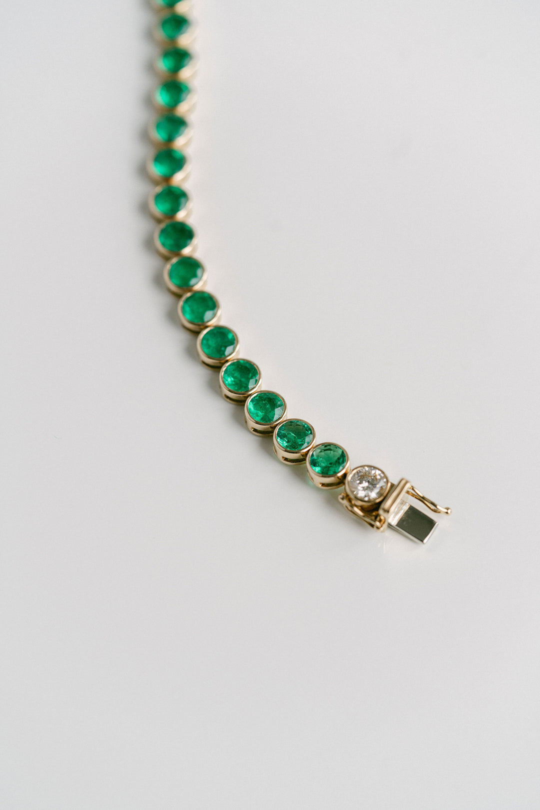 Round Colombian Emerald Bezel Tennis Bracelet With Diamonds, 14k Yellow Gold