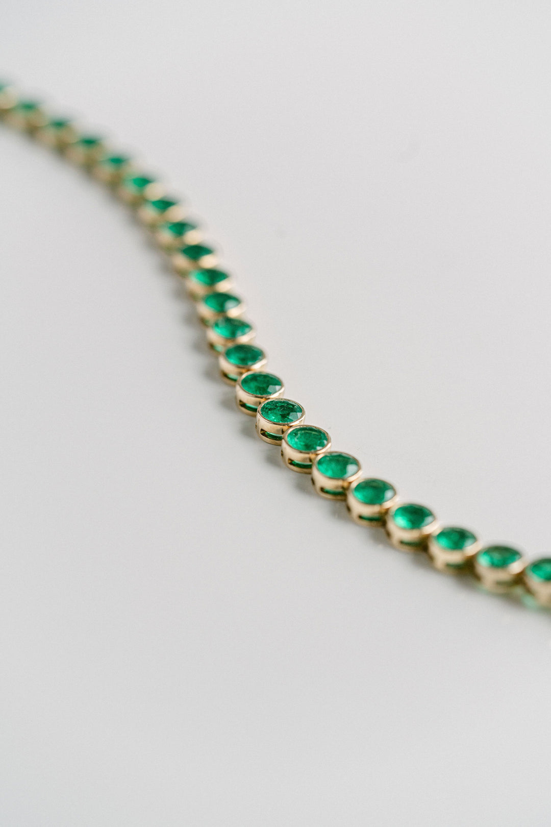 Round Colombian Emerald Bezel Tennis Bracelet With Diamonds, 14k Yellow Gold