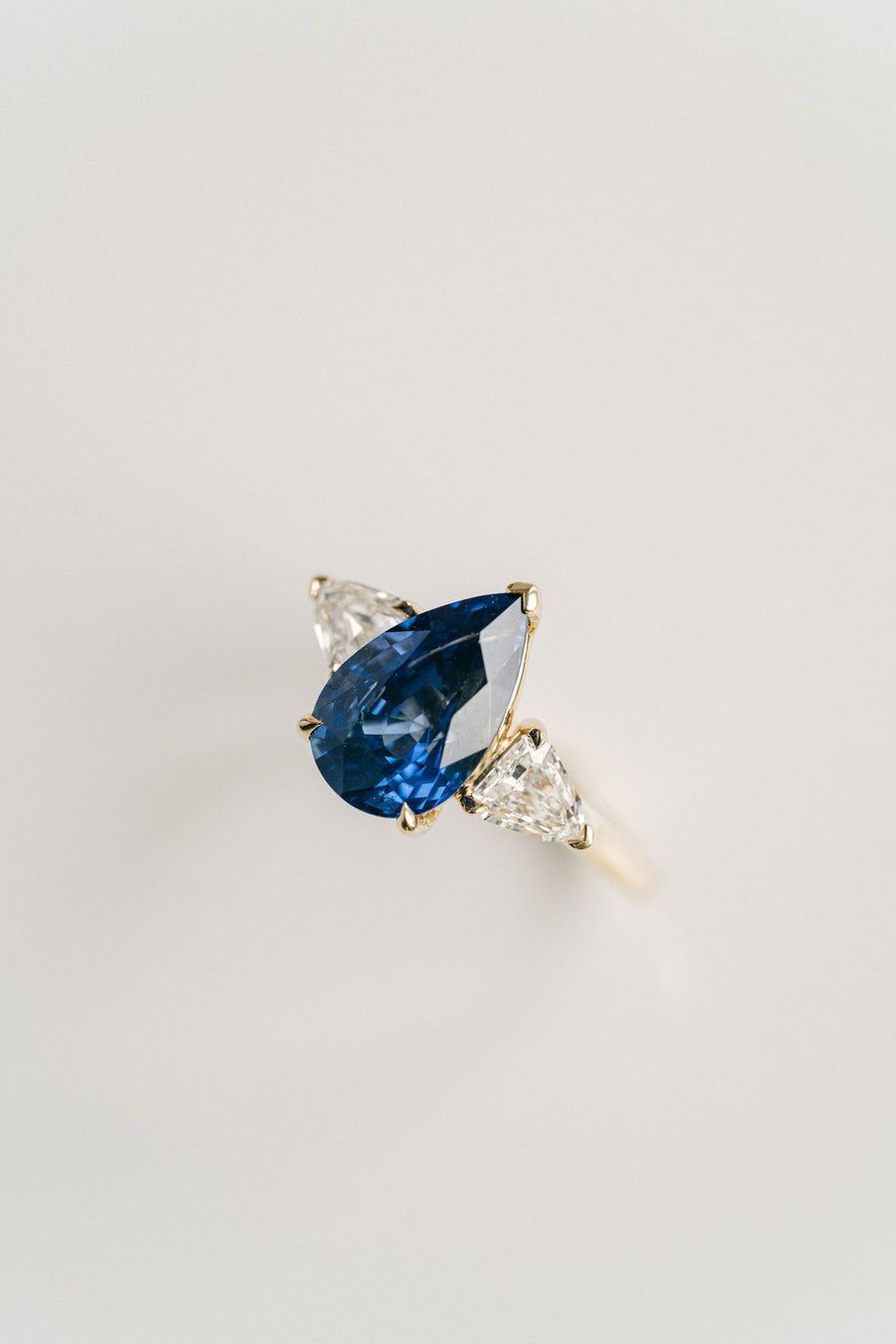 Pear Shape Blue Sri Lankan Sapphire With Shield Shape Diamond Accents, 14k Yellow Gold