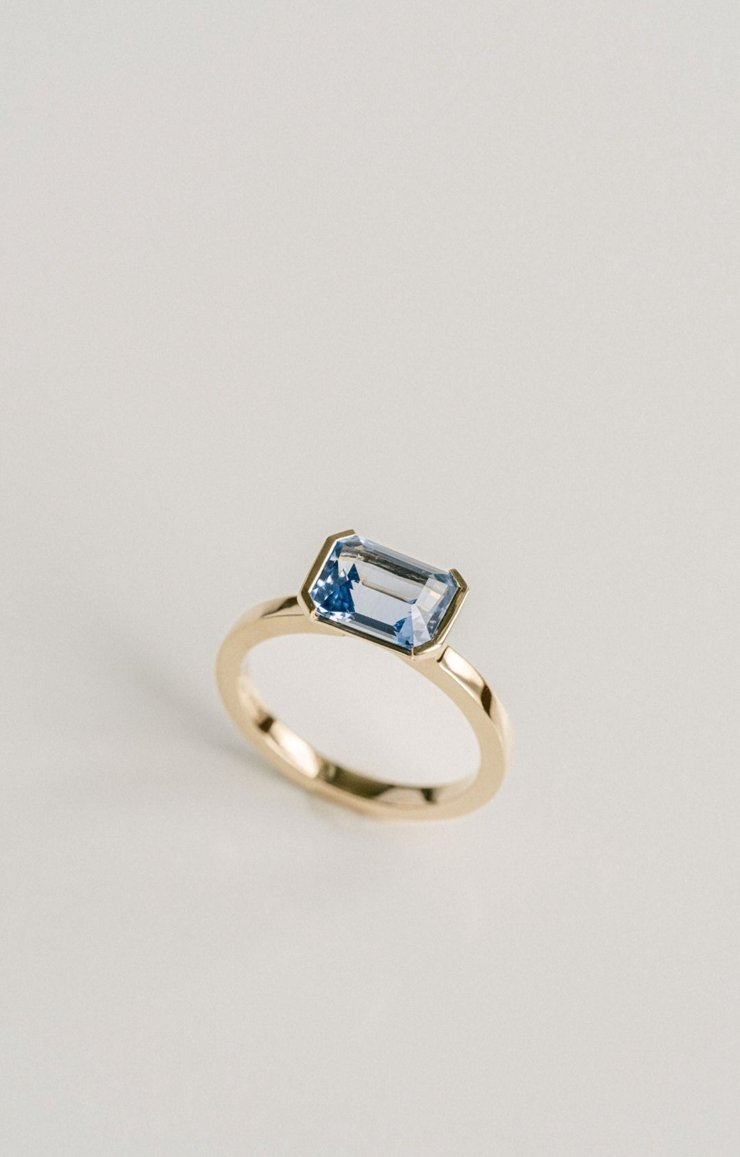 Emerald Cut Blue Sri Lankan Sapphire East-West Half Bezel, 14k Yellow Gold