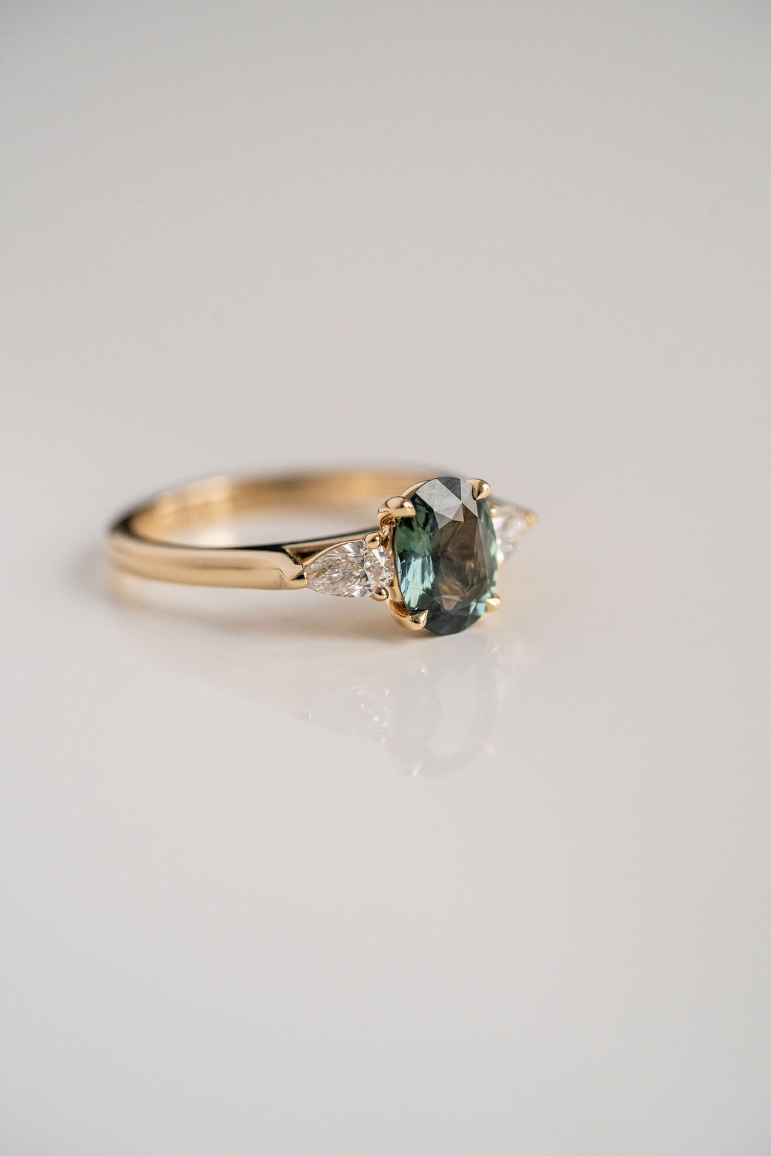 1.59ct. Oval Blue-Green Sri Lankan Sapphire Engagement Ring With Pear Shape Diamond Accents, 14k Yellow Gold