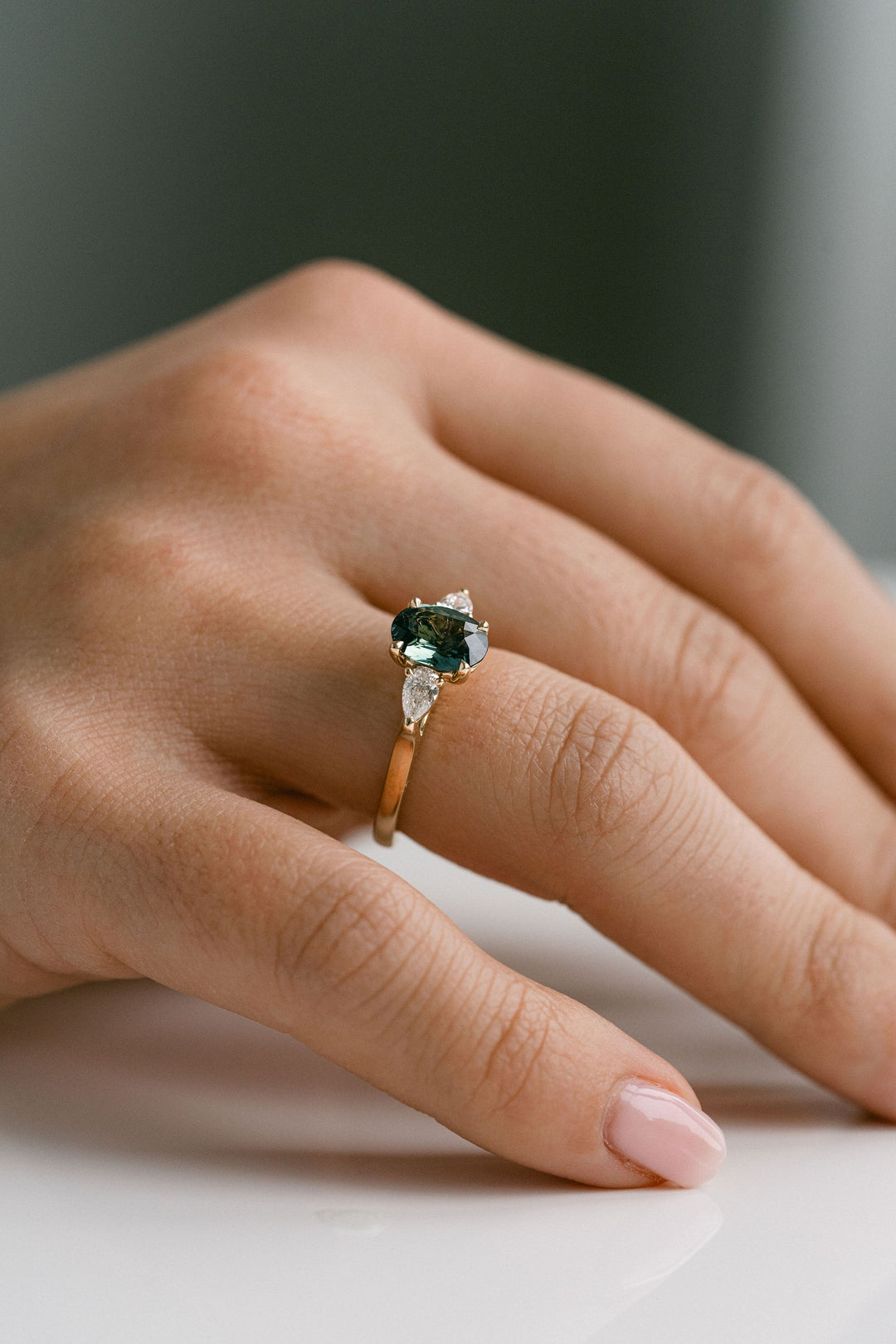 1.59ct. Oval Blue-Green Sri Lankan Sapphire Engagement Ring With Pear Shape Diamond Accents, 14k Yellow Gold