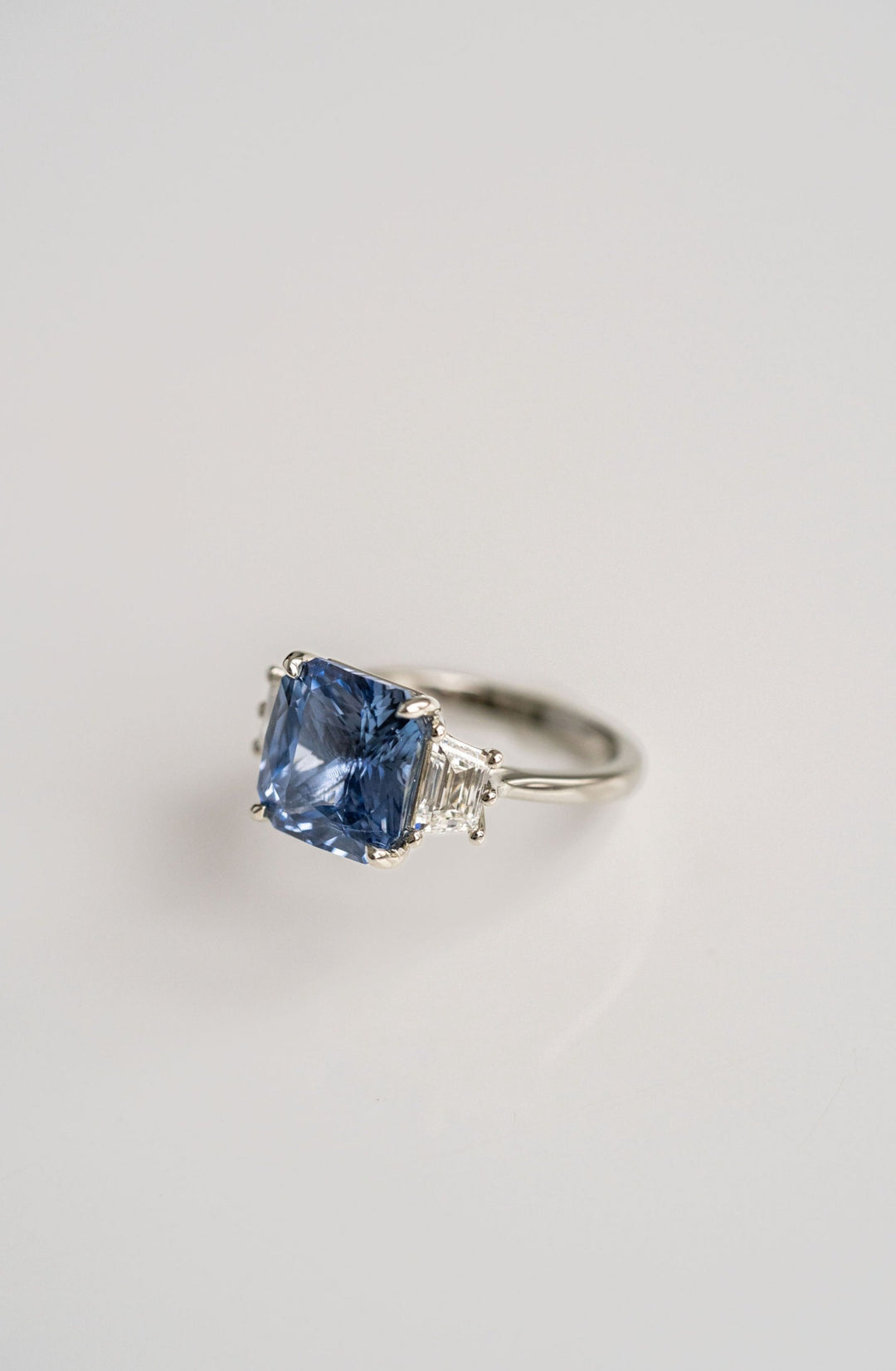 6.20ct Radiant Cut Blue Sri Lankan Sapphire With Trapezoid Diamond Accents, 14k White Gold