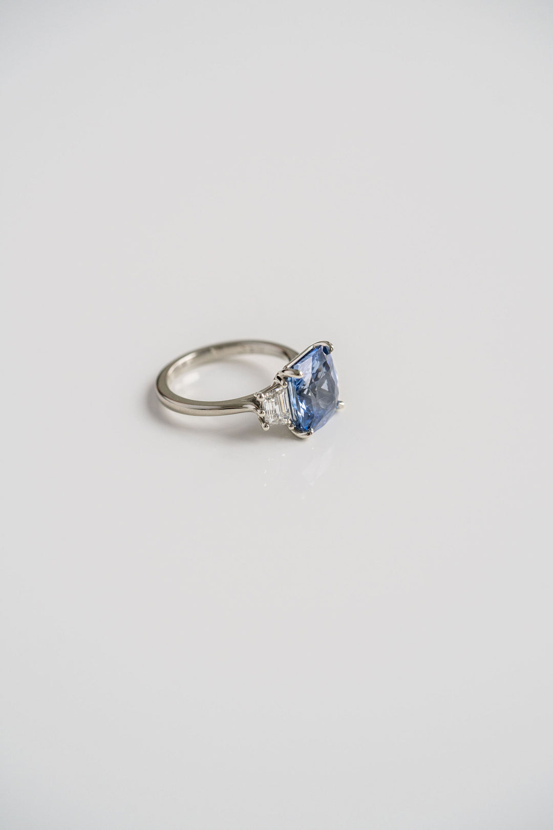 6.20ct Radiant Cut Blue Sri Lankan Sapphire With Trapezoid Diamond Accents, 14k White Gold