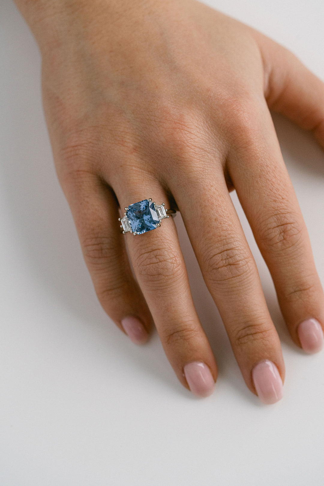 6.20ct Radiant Cut Blue Sri Lankan Sapphire With Trapezoid Diamond Accents, 14k White Gold