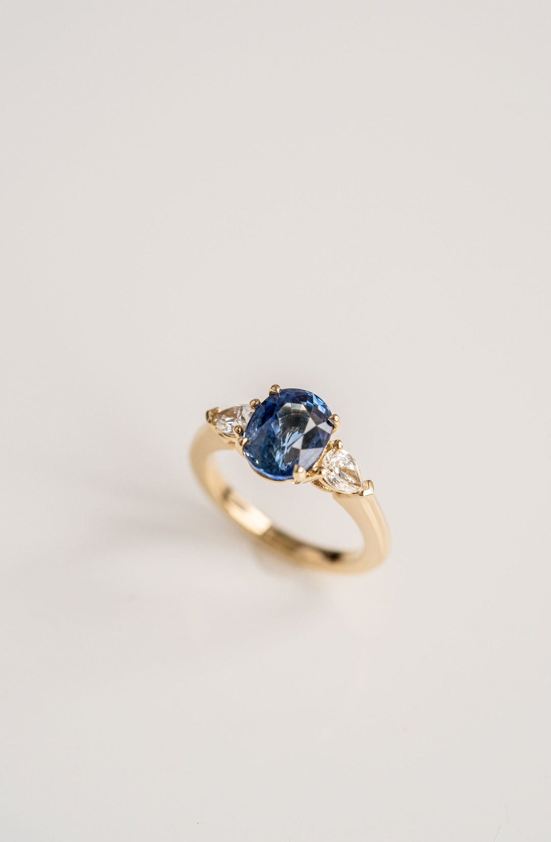 3.24ct. Oval Blue Sri Lankan Sapphire Engagement Ring With Pear Shape Diamond Accents, 14k Yellow Gold