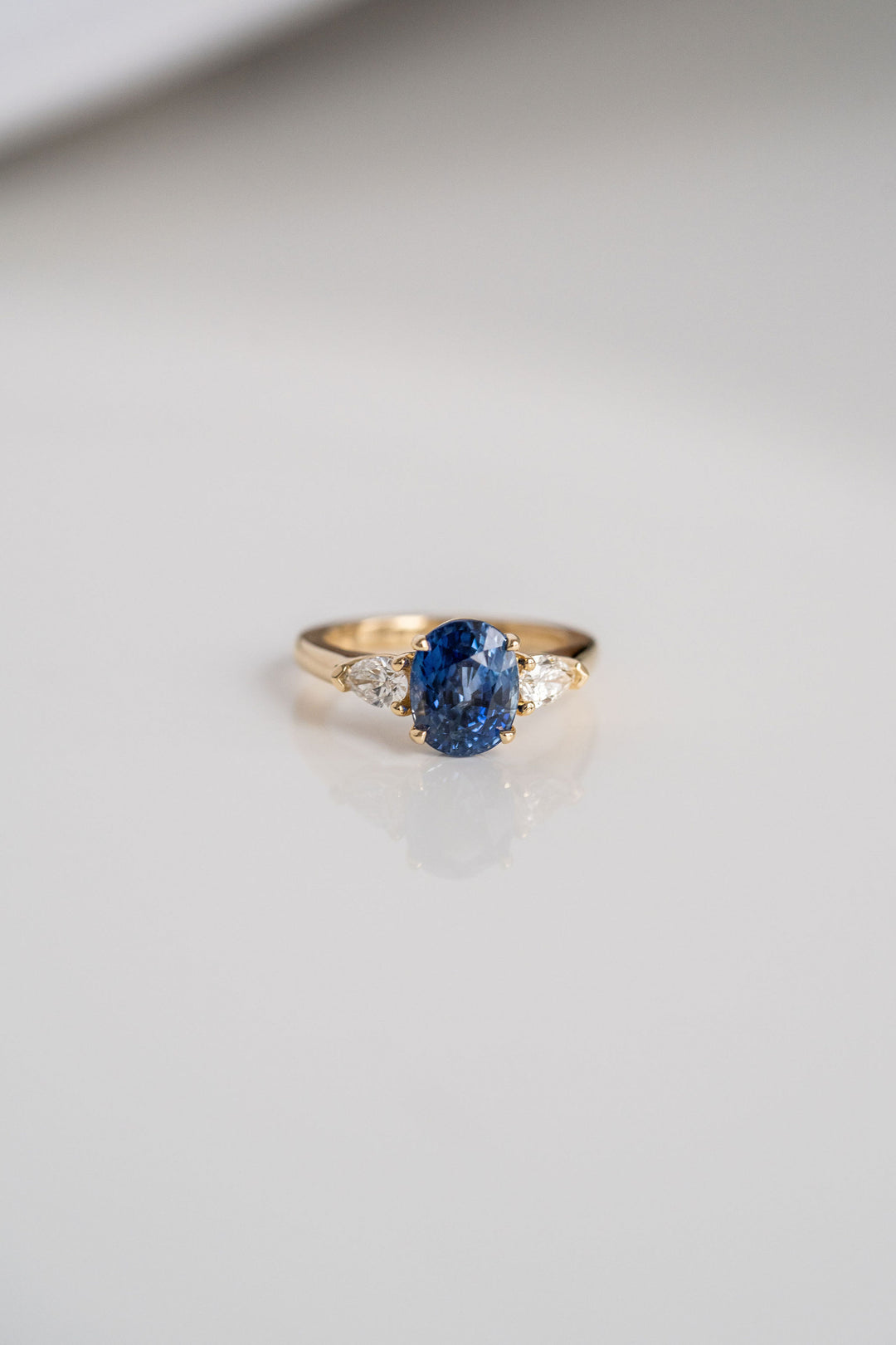 3.24ct. Oval Blue Sri Lankan Sapphire Engagement Ring With Pear Shape Diamond Accents, 14k Yellow Gold