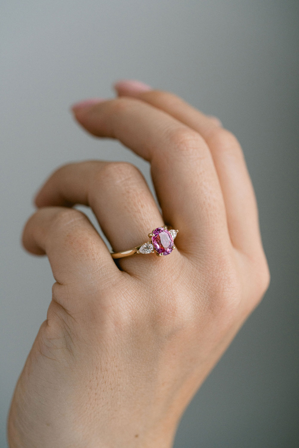 2.18ct. Vivid Pink Oval Sri Lankan Sapphire With Pear Shape Diamond Accents, 14k Yellow Gold