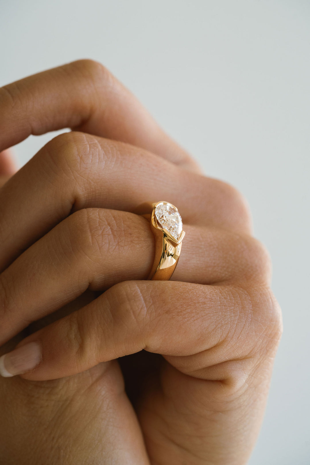 Pear Shape Diamond East-West Half Bezel Haven Ring Narrow