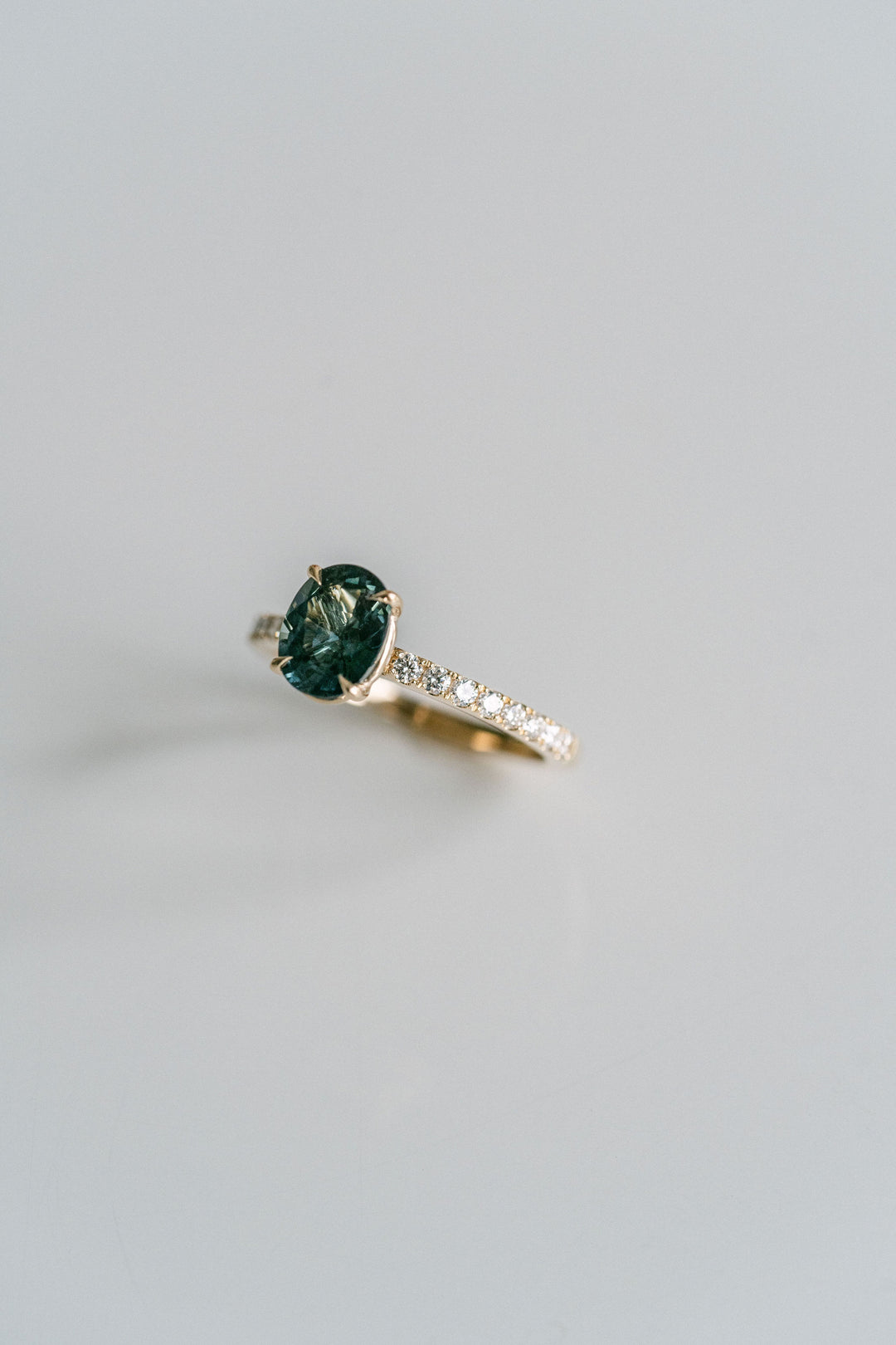Oval Blue-Green Sapphire Cavalier Solitaire With Diamond Pavè Band