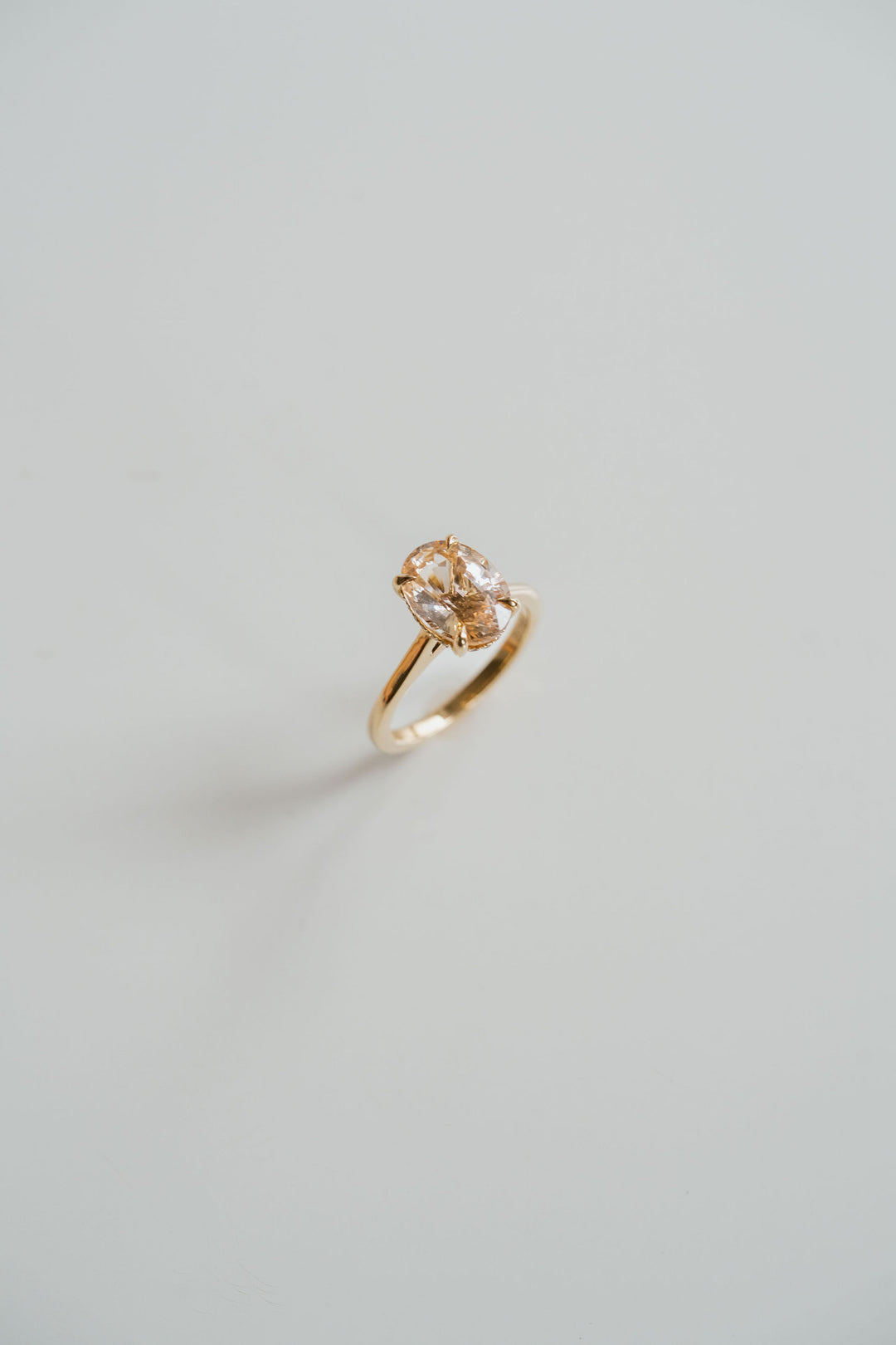Oval Peach Sapphire Dominion With Diamond Collar