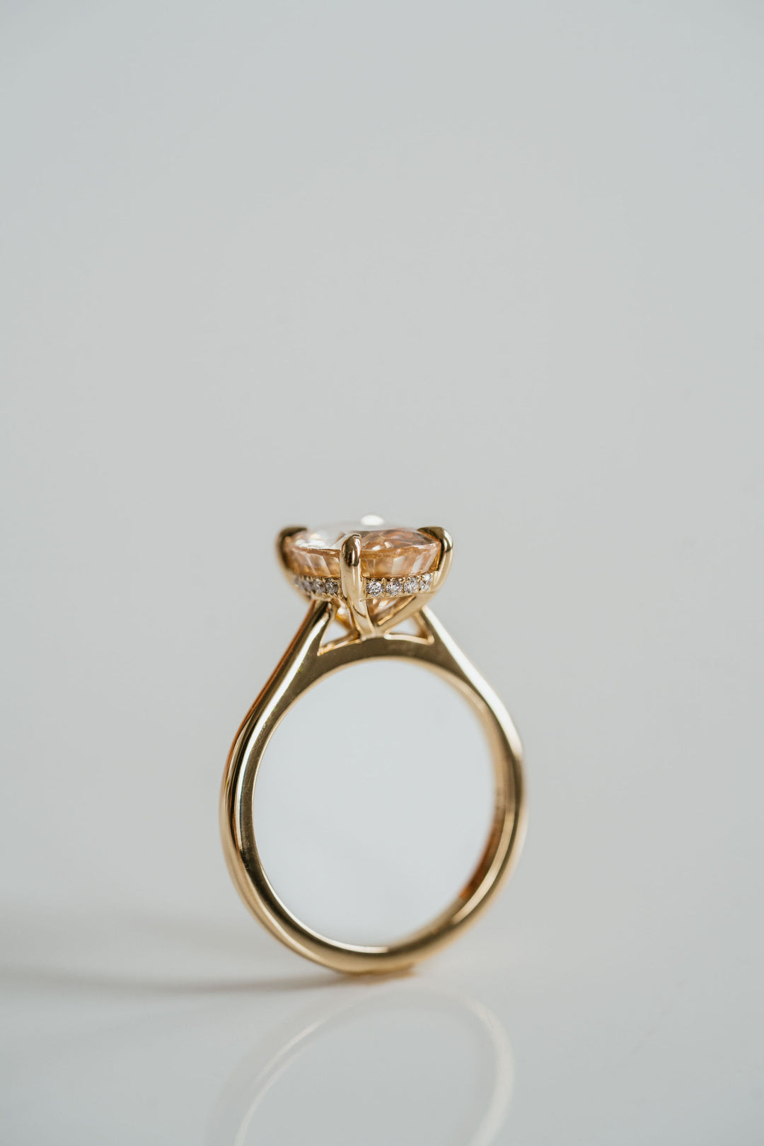 Oval Peach Sapphire Dominion With Diamond Collar