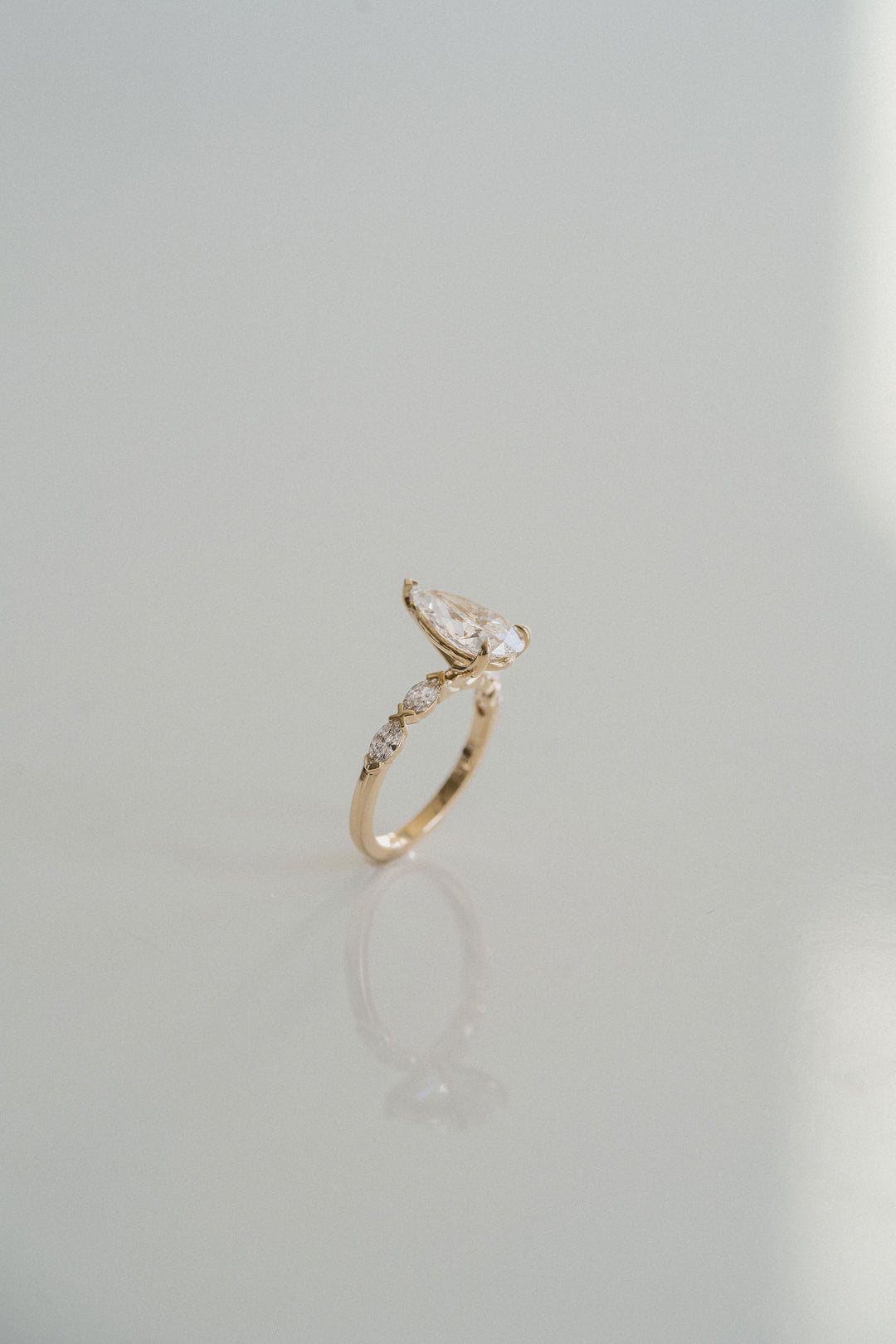 Pear Shape Diamond With Marquise Diamond XO Band