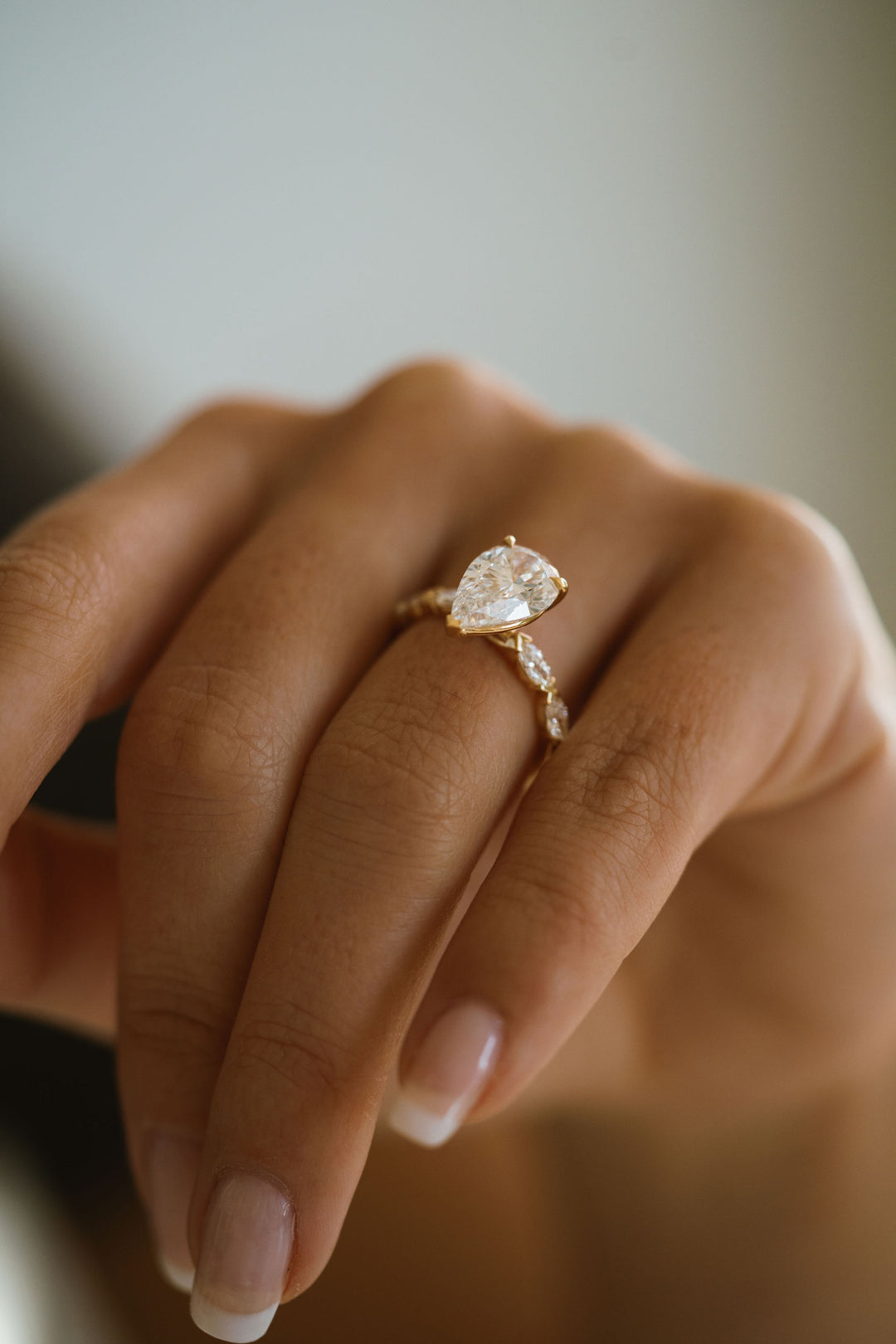 Pear Shape Diamond With Marquise Diamond XO Band