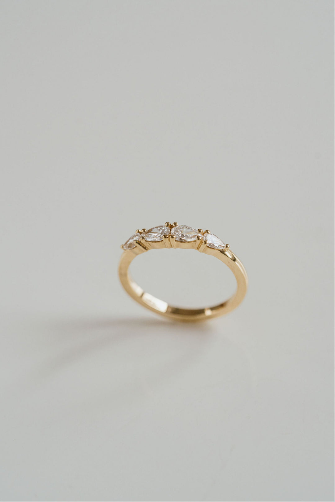 Pear Shape East-West Diamond Band