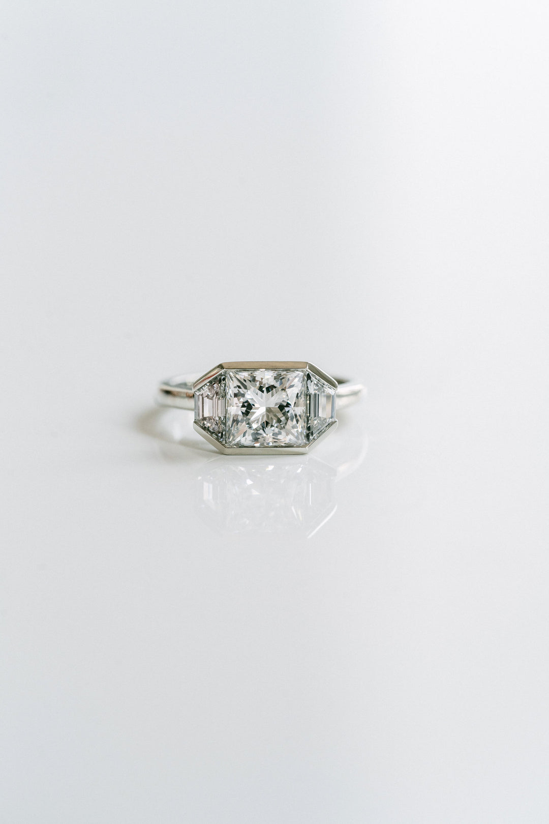 Princess Cut Diamond Monochrome Ring With Trapezoid Accents
