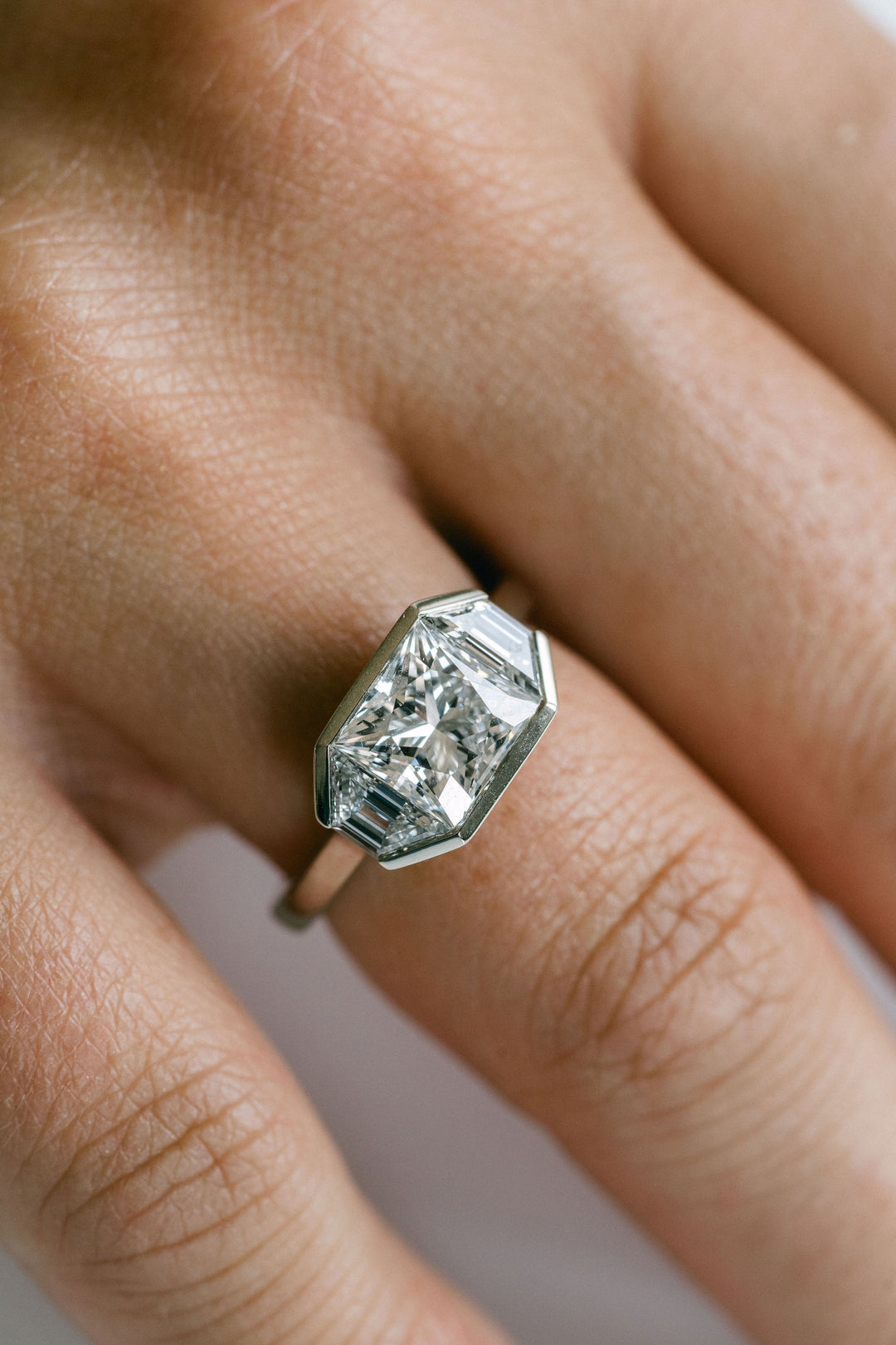 Princess Cut Diamond Monochrome Ring With Trapezoid Accents