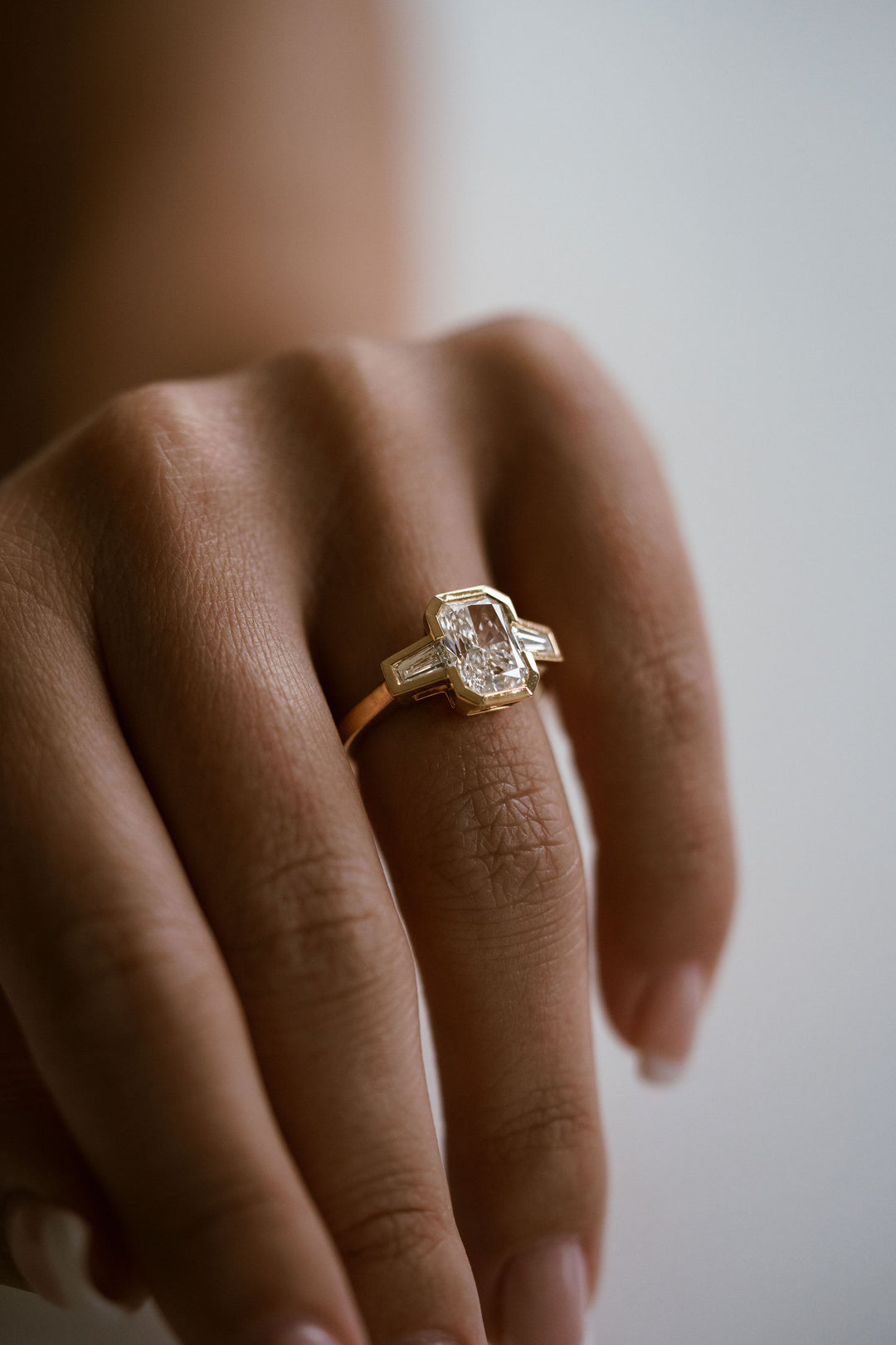 Radiant Cut Diamond Full Bezel With Tapered Baguette Accents