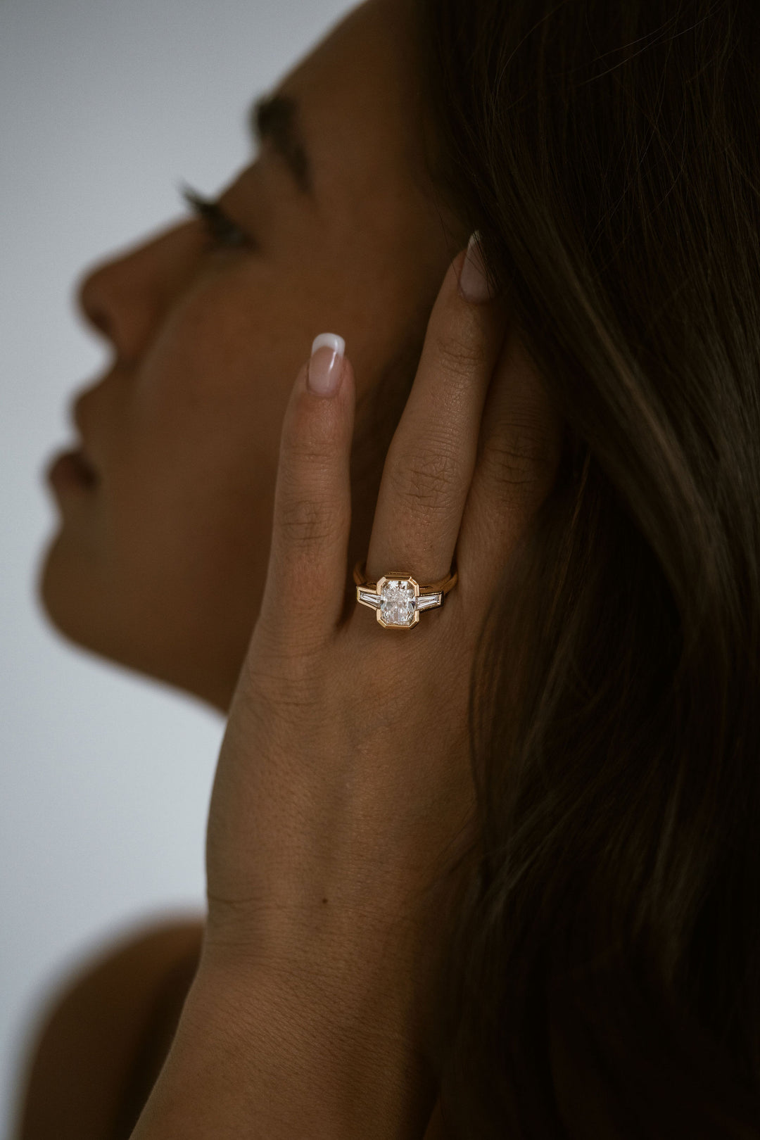 Radiant Cut Diamond Full Bezel With Tapered Baguette Accents