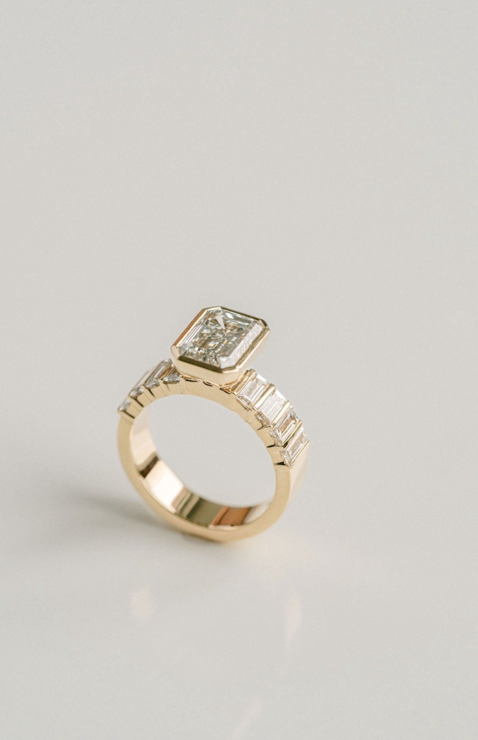 Emerald Cut Diamond Ring With Bar Set Baguette Diamond Band - Cavalier Spring Bridal 2024