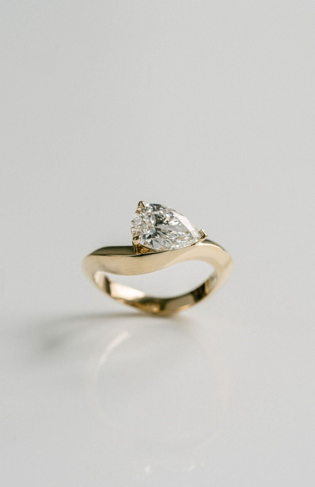 Pear Shape Diamond Knife-Edge Sway Engagement Ring 14k YG - Cavalier Spring Bridal 2024