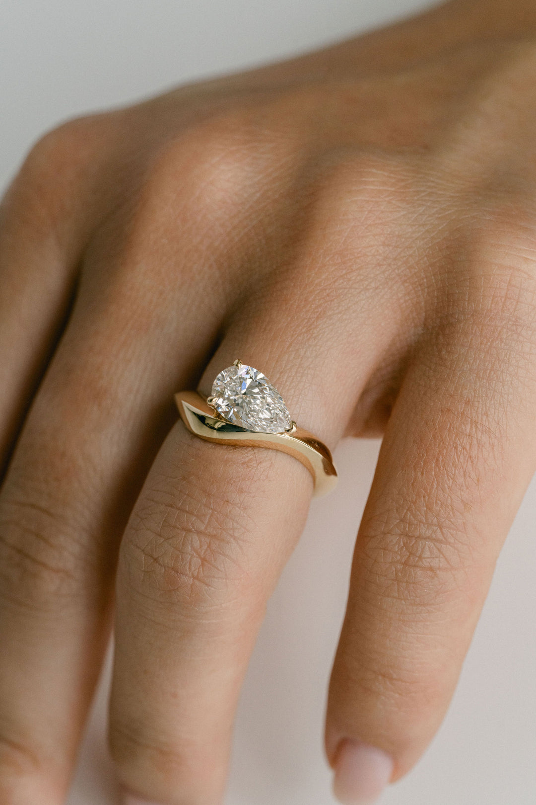 Pear Shape Diamond Knife-Edge Sway Engagement Ring 14k YG - Cavalier Spring Bridal 2024