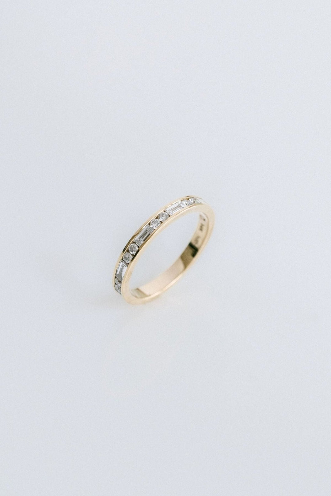 Round Brilliant and Baguette Cut Diamond Alternating Channel Set Band