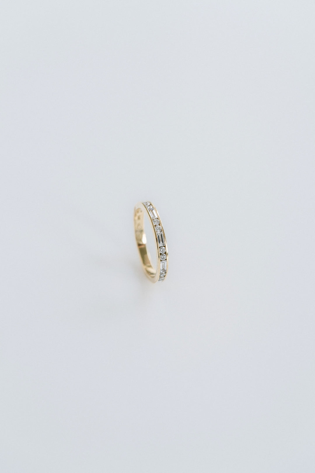 Round Brilliant and Baguette Cut Diamond Alternating Channel Set Band