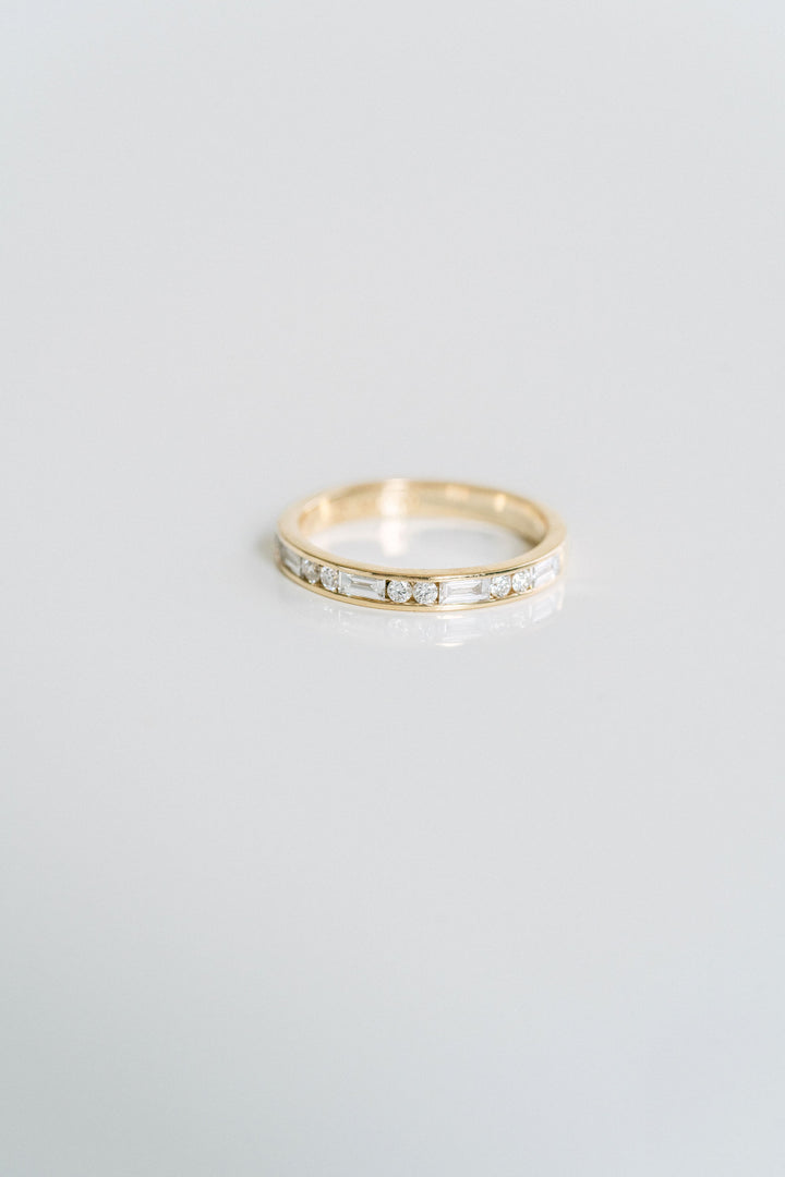 Round Brilliant and Baguette Cut Diamond Alternating Channel Set Band