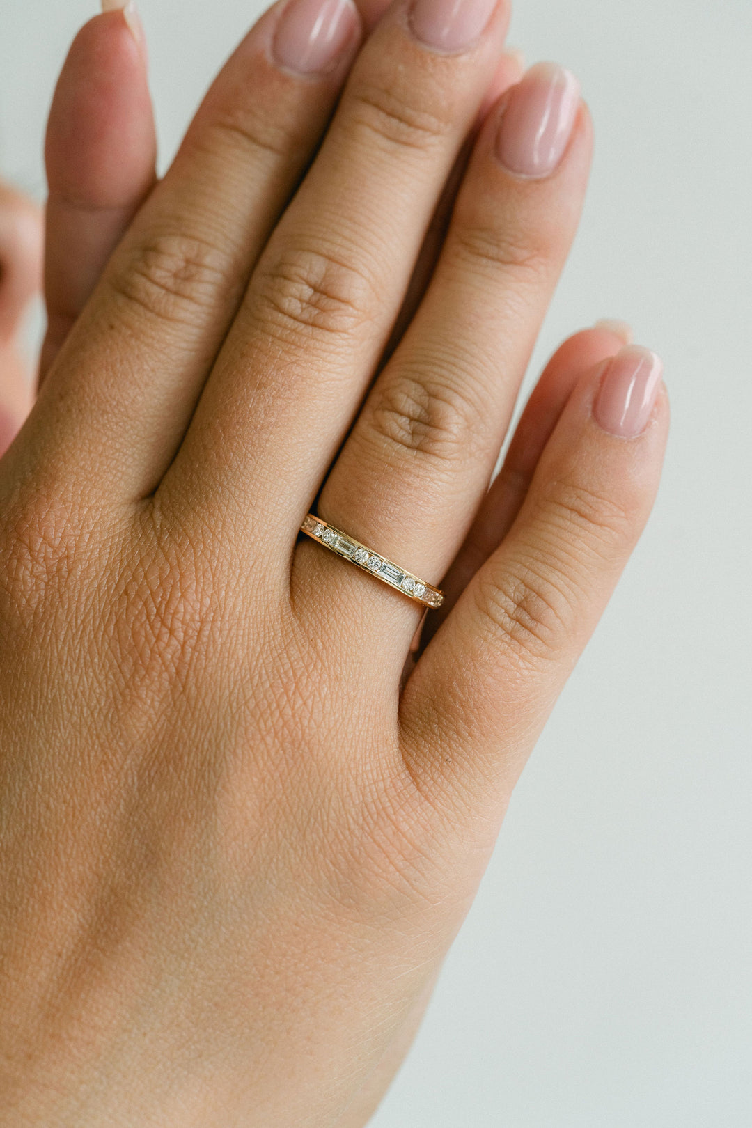 Round Brilliant and Baguette Cut Diamond Alternating Channel Set Band