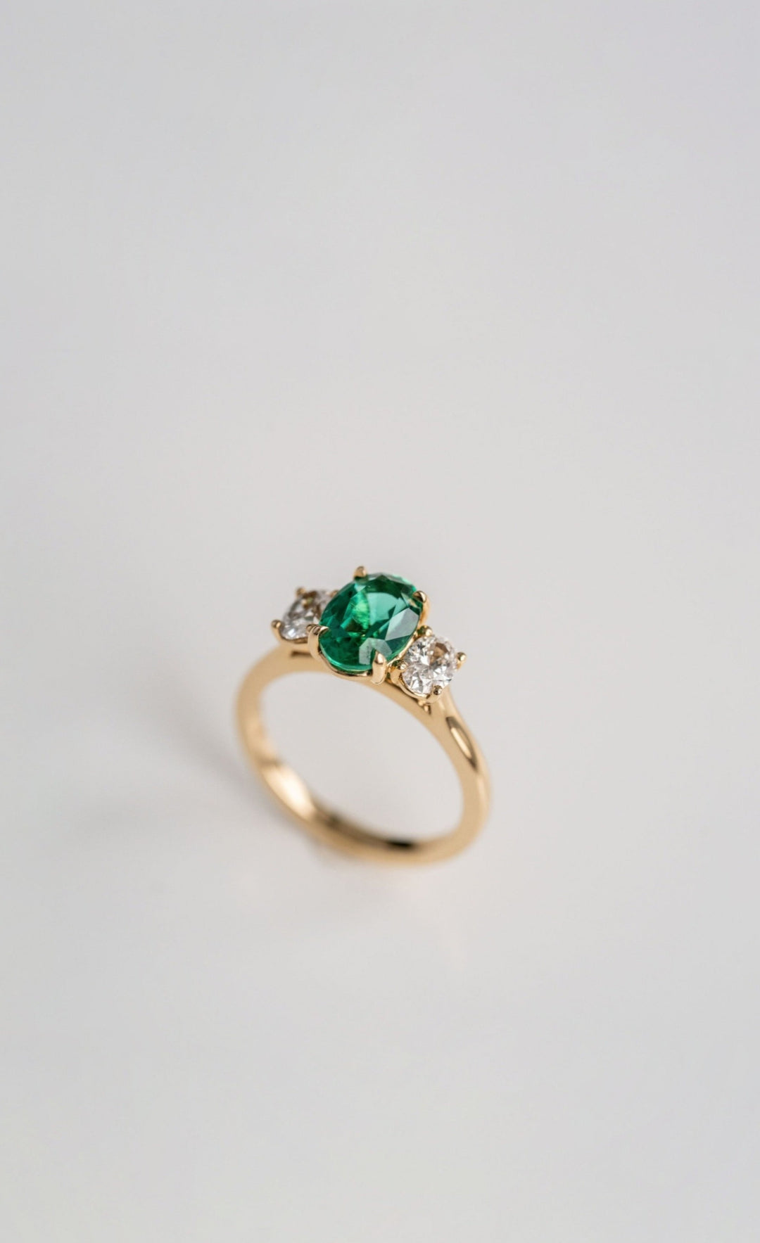 Oval Emerald With Oval Diamond Accents