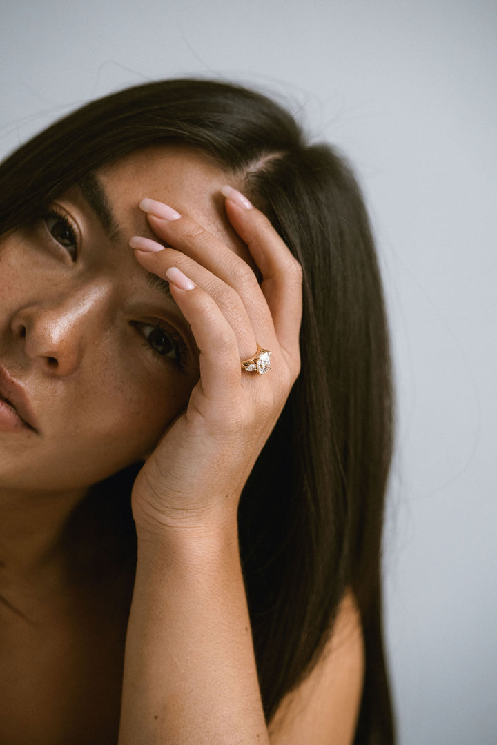 Elongated Cushion Cut Diamond With Pear Accents And Collar