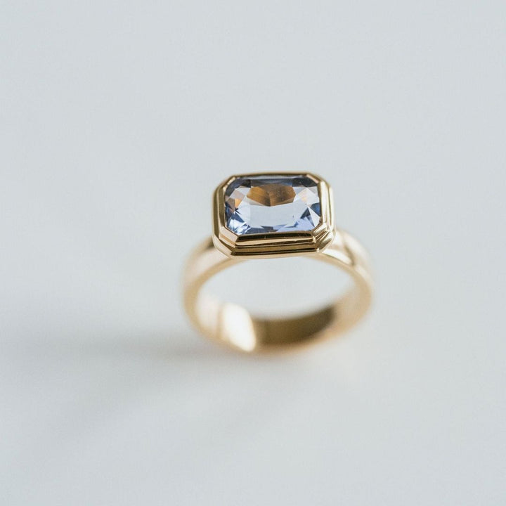 Emerald Cut Blue Sapphire Retro Bezel