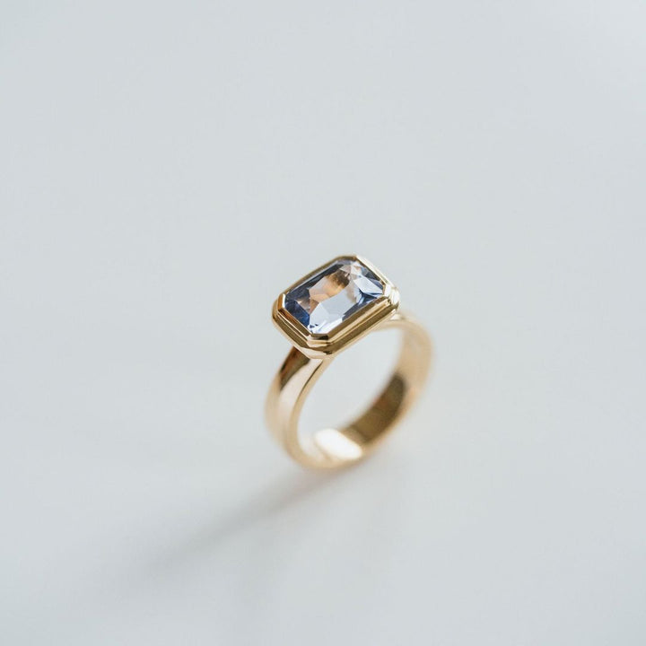 Emerald Cut Blue Sapphire Retro Bezel