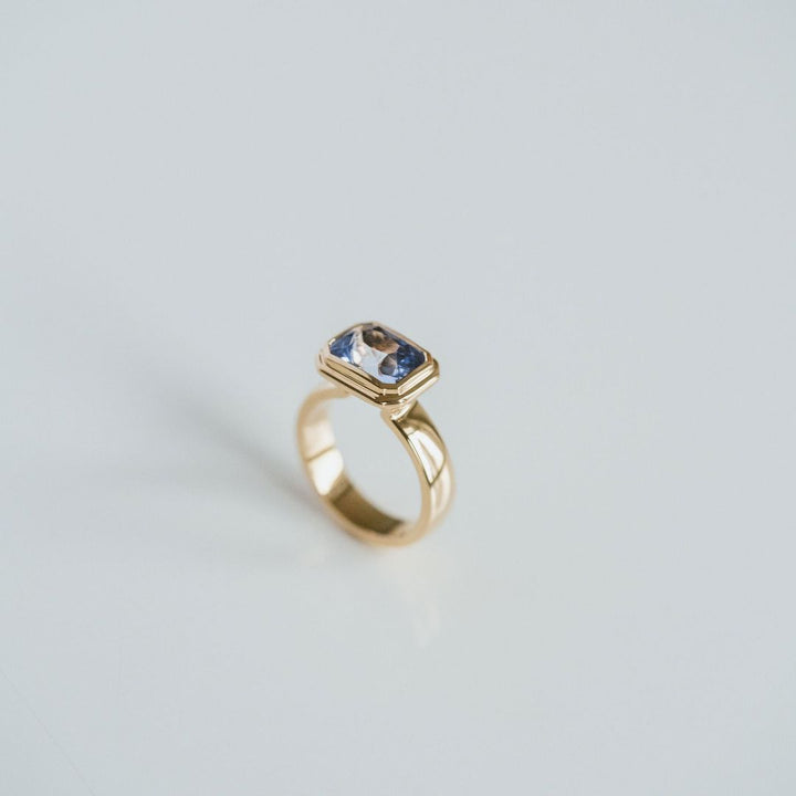 Emerald Cut Blue Sapphire Retro Bezel