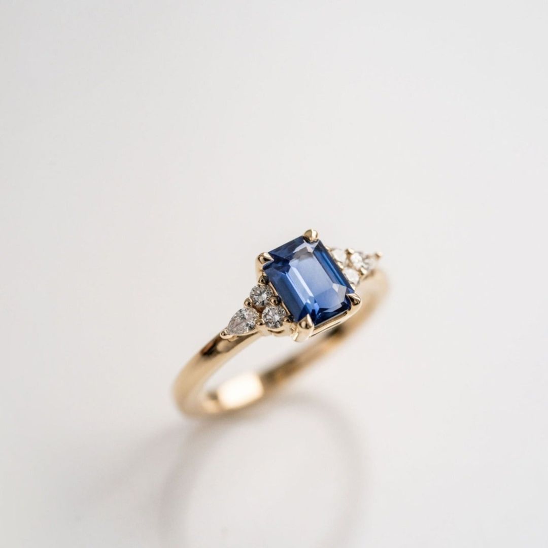 Emerald Cut Blue Sapphire With Diamond Cluster Accents