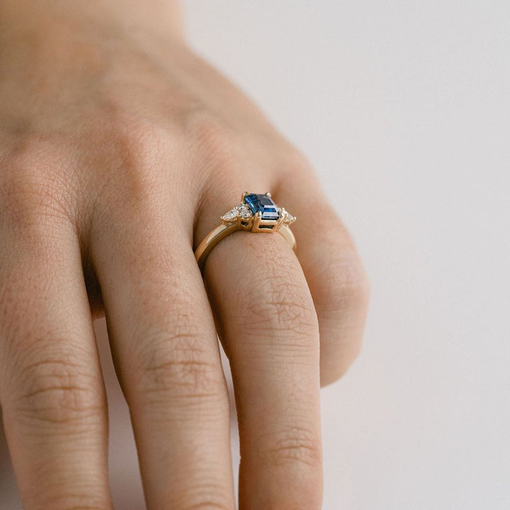 Emerald Cut Blue Sapphire With Diamond Cluster Accents