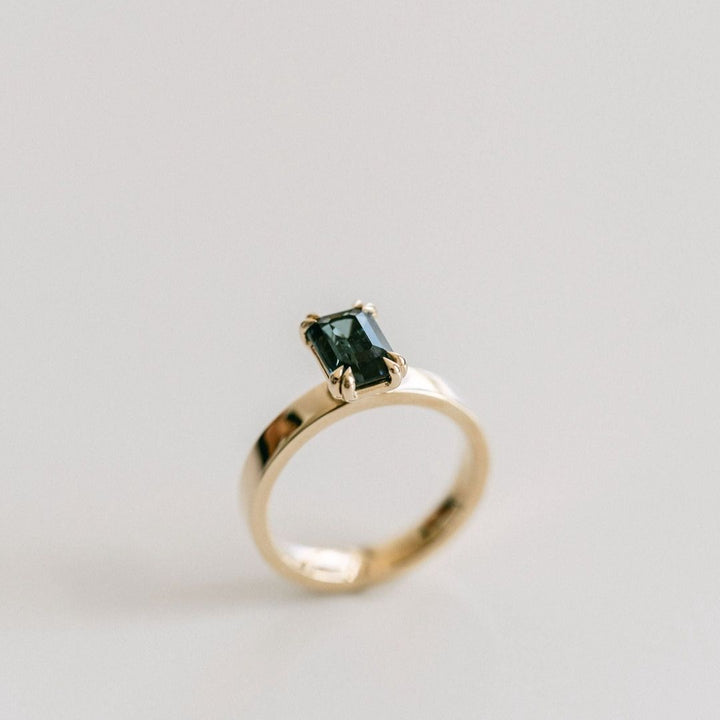 Emerald Cut Double Prong Blue-Green Sapphire Ring