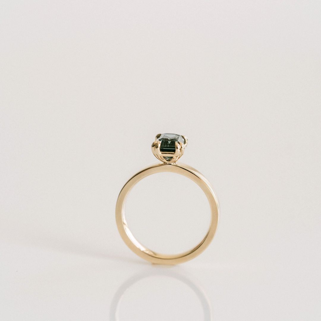 Emerald Cut Double Prong Blue-Green Sapphire Ring
