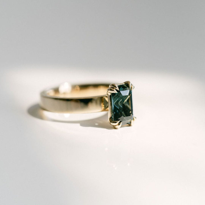Emerald Cut Double Prong Blue-Green Sapphire Ring