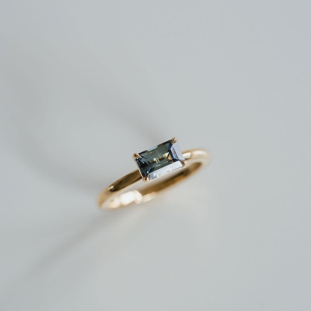 Emerald Cut East-West Blue Green Sapphire Solitaire