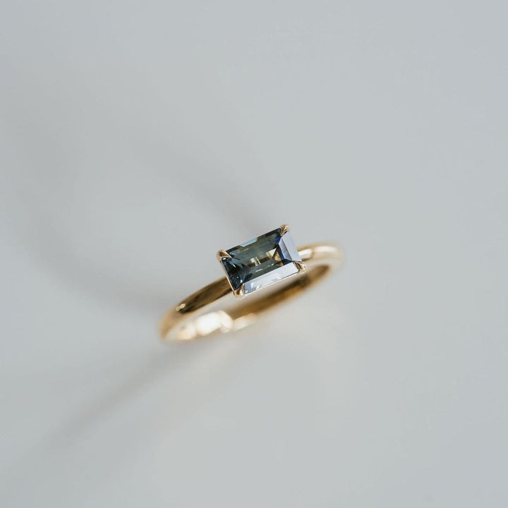 Emerald Cut East-West Blue Green Sapphire Solitaire
