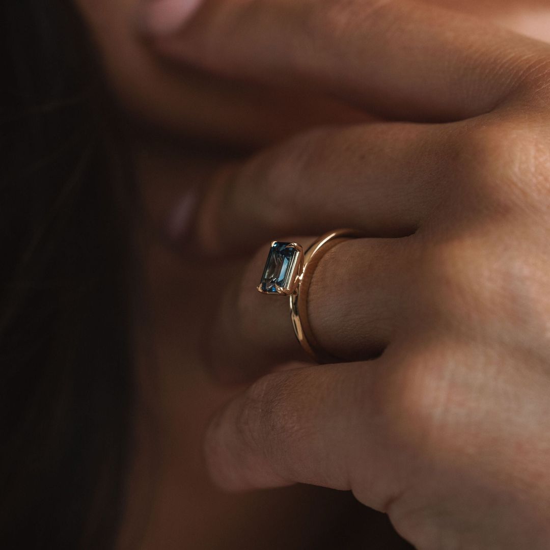 Emerald Cut East-West Blue Green Sapphire Solitaire